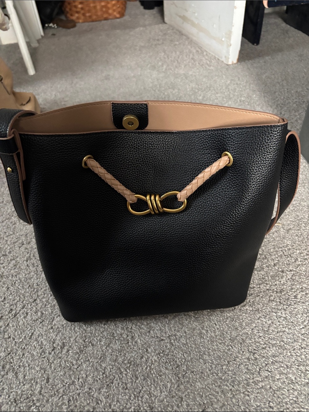 Black and Tan Leather Bucket Bag with Braided Accent